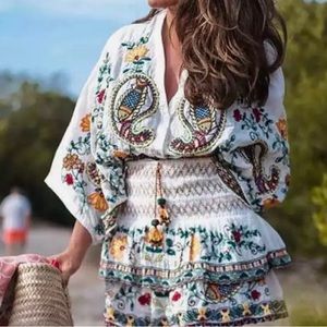 New. Boho inspired beautifully embroidered batwing oversized summer top.